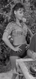 Dawn Wells shows her tummy (but no belly button).